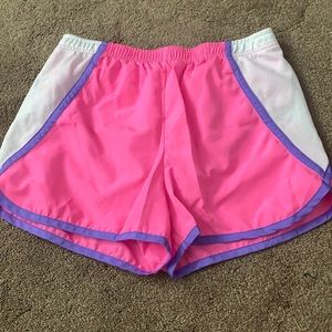 Pink, purple, and white athletic shorts
